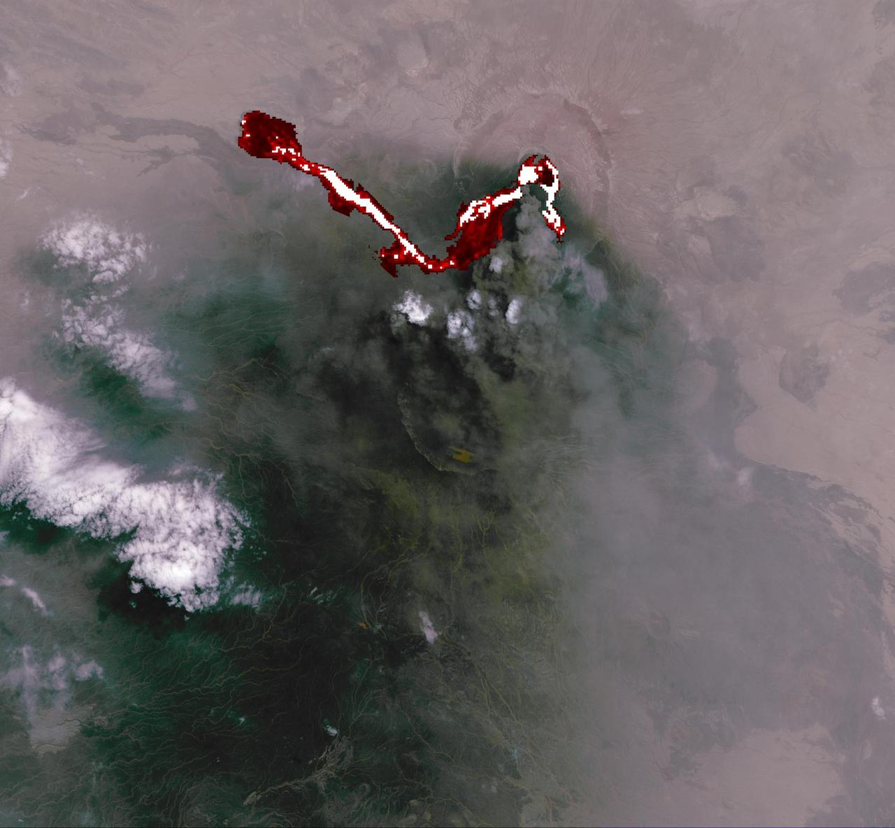 This image of Africa Nabro volcano in Eritrea was acquired by NASA Terra spacecraft on July 6, 2011. Ash plumes sent into the stratosphere disrupted air traffic in Sudan, Djibouti, Ethiopia and Sudan.