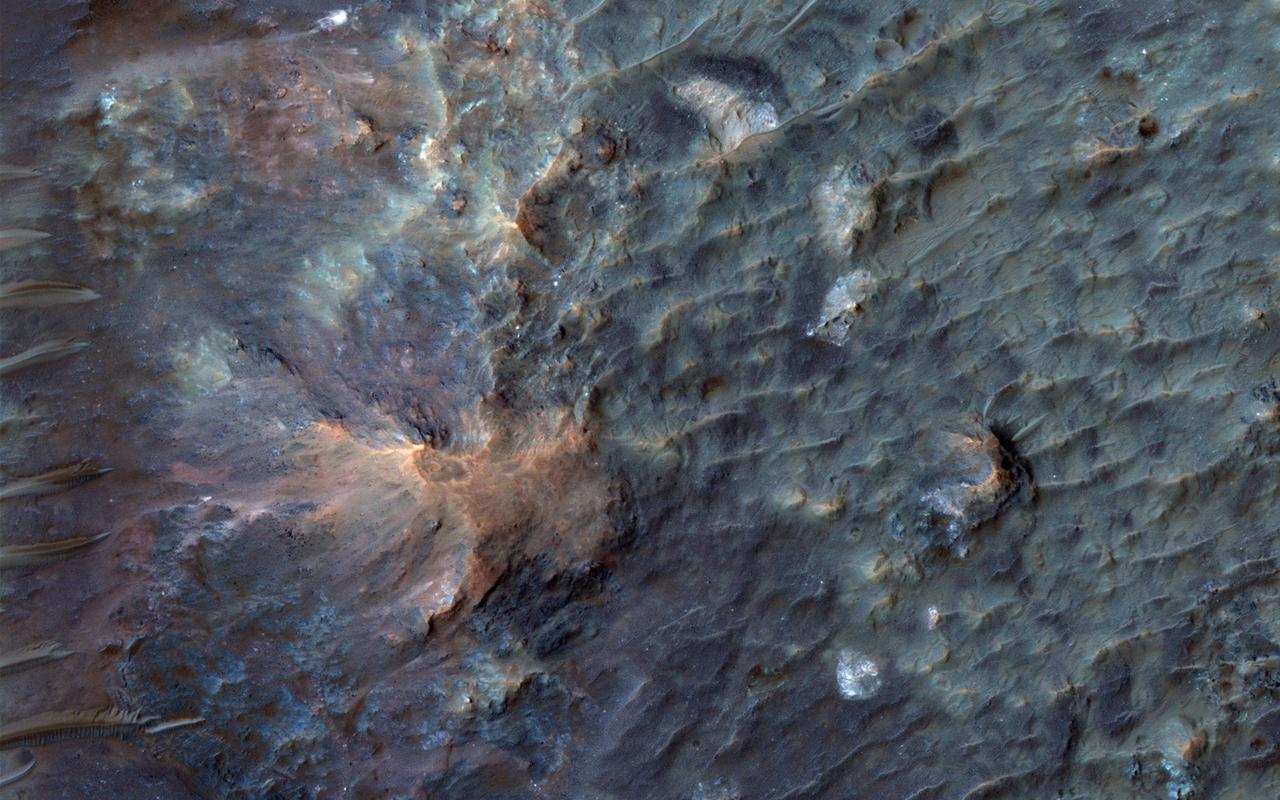 This crater on Mars, observed by NASA Mars Reconnaissance Orbiter, was named after Dr. Gerald A. Soffen February 7, 1926 - November 22, 2000, and this image covers a small portion of the crater floor.  http://photojournal.jpl.nasa.gov/catalog/PIA14453