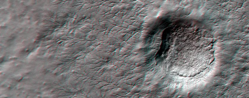 This anaglyph from NASA Mars Reconnaissance Orbiter shows erosional features formed by seasonal frost near the south pole of Mars. 3D glasses are necessary to view this image.