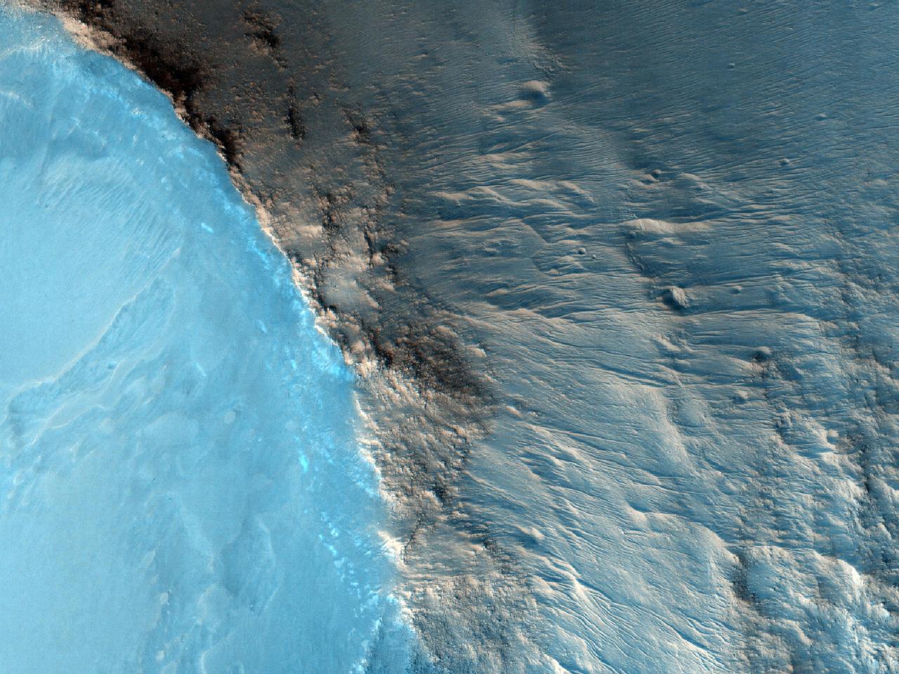 The suggested area in this observation from NASA Mars Reconnaissance Orbiter is characterized by a group of cones, shield-like features, and round mounds. They are a few hundred meters to kilometers in diameter but their heights are unknown.