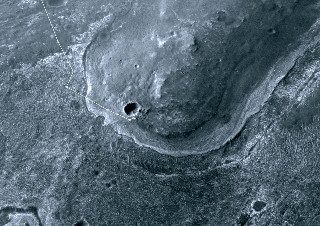 This image taken from orbit shows the path driven by NASA Mars Exploration Rover Opportunity in the weeks around the rover arrival at the rim of Endeavour crater.