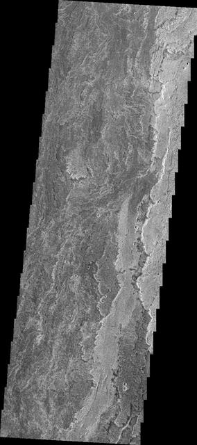 This image from NASA 2001 Mars Odyssey spacecraft shows lava flows from Arsia Mons.