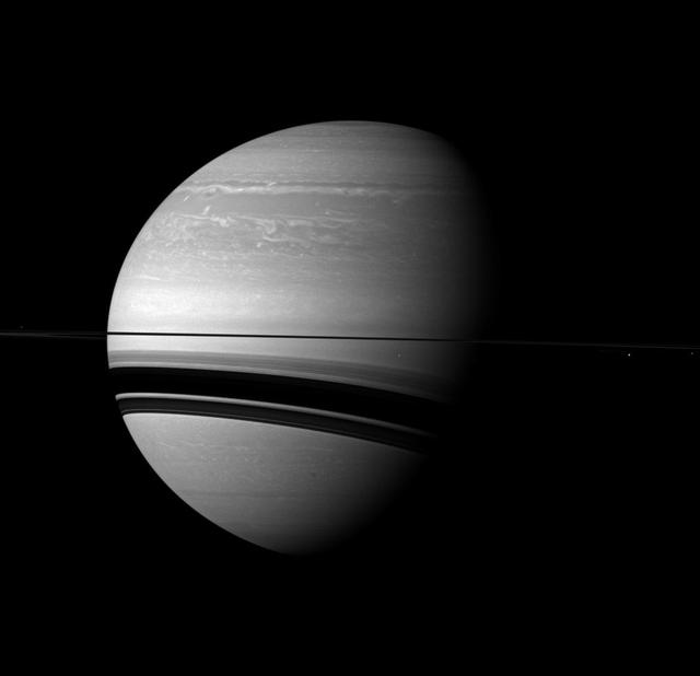 NASA Cassini spacecraft examines Saturn and the planet northern hemisphere, which was ravaged by a huge storm for much of 2011.