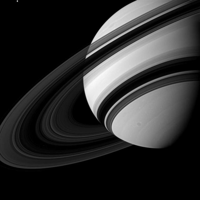 Tethys may not be tiny by normal standards, but when it is captured alongside Saturn, it cant help but seem pretty small in this image from NASA Cassini spacecraft.