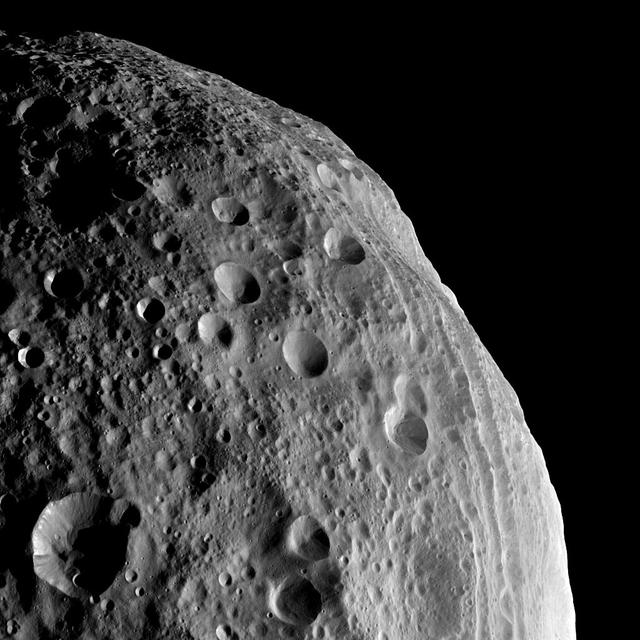 NASA image: Up and Down in Vesta Cratered Terrain
