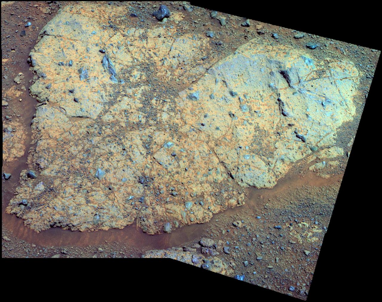 An outcrop informally named Chester Lake is the second rock on the rim of Endeavour crater to be approached by NASA Mars Exploration Rover Opportunity for close inspection. Chester Lake is about 3 feet 1 meter across.