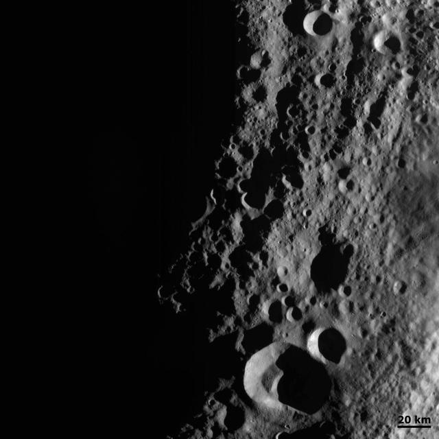 This detail of NASA Dawn spacecraft framing camera image shows low sun angles and large shadows on asteroid Vesta.