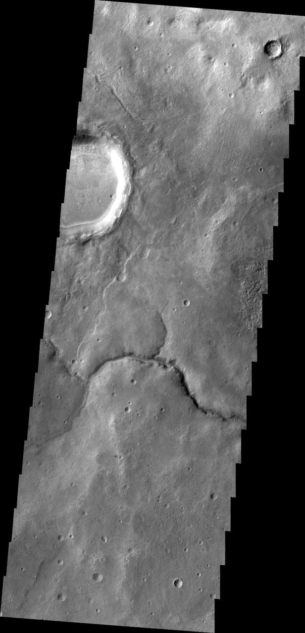 This unnamed channel drains the highland region near Pulawy Crater as seen by NASA 2001 Mars Odyssey spacecraft.
