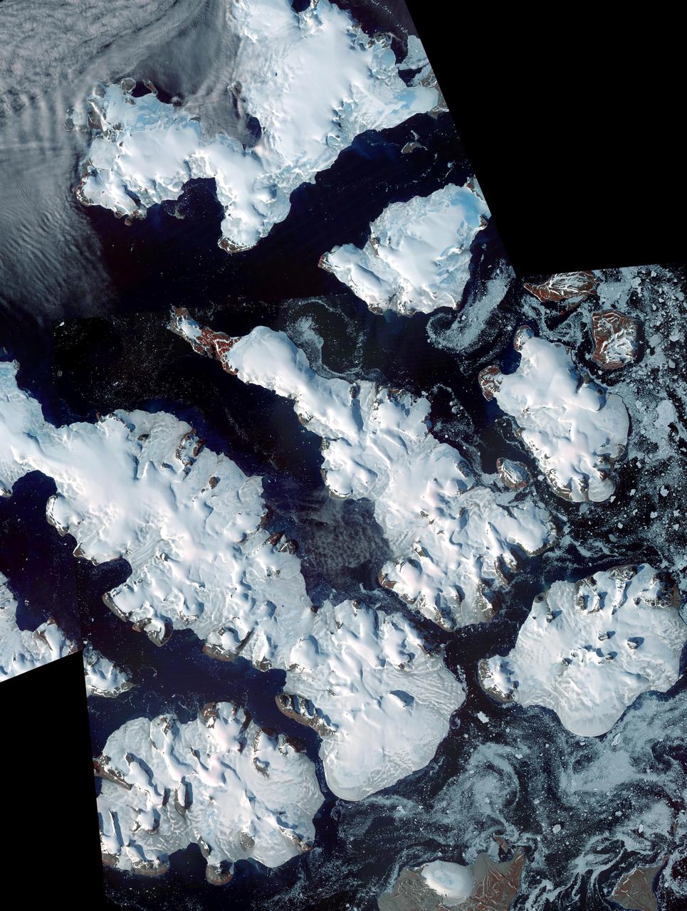 This image from NASA Terra spacecraft is of Franz Josef Land, an archipelago in the far north of Russia. It consists of 191 islands covering an area of about 200 by 325 km, and has no native inhabitants.