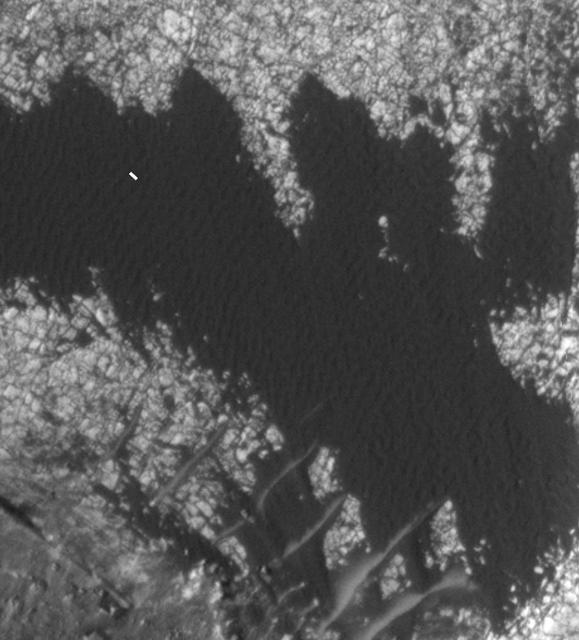 A rippled patch of sand in Becquerel Crater on Mars moved about two meters about two yards between November 24, 2006 and September 5, 2010, in one of two images taken by NASA Mars Reconnaissance Orbiter.