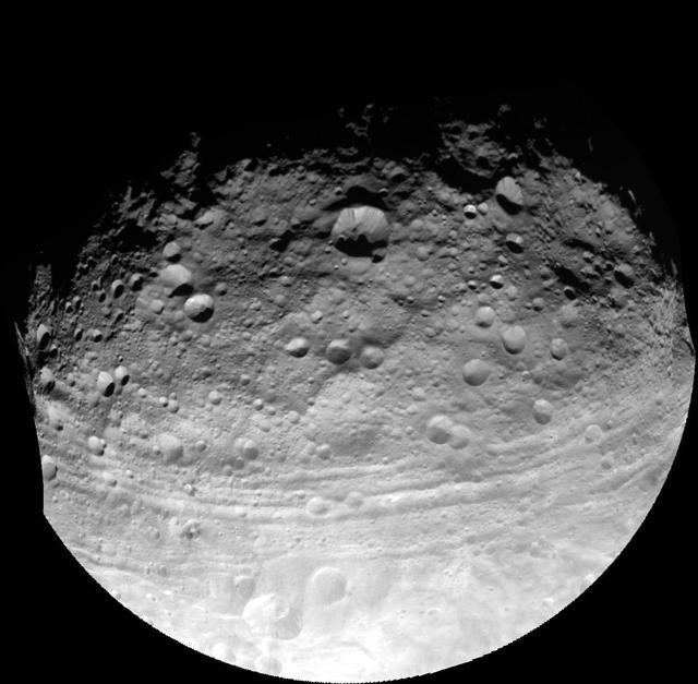 This full view of the giant asteroid Vesta was taken by NASA Dawn spacecraft, as part of a rotation characterization sequence on July 24, 2011, at a distance of 3,200 miles and shows impact craters of various sizes and grooves parallel to the equator.