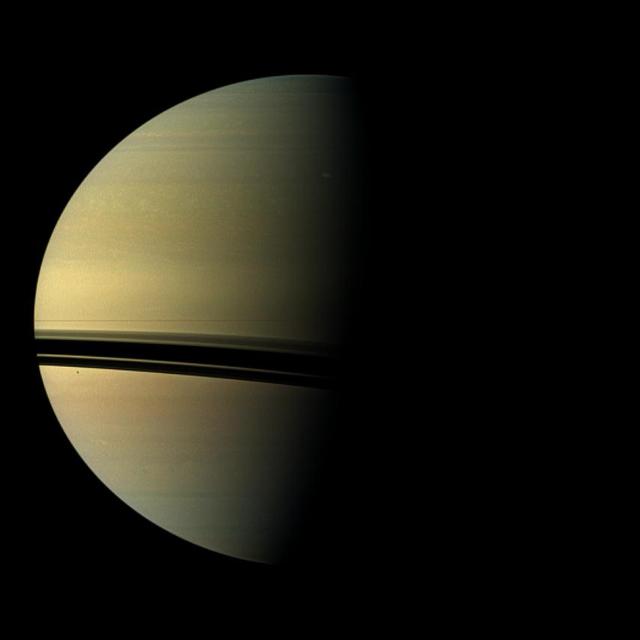 The largest storm to ravage Saturn in decades started as a small spot seen in this image from NASA Cassini spacecraft on Dec. 5, 2010 -- the same day Cassini also detected frequent lightning signals.