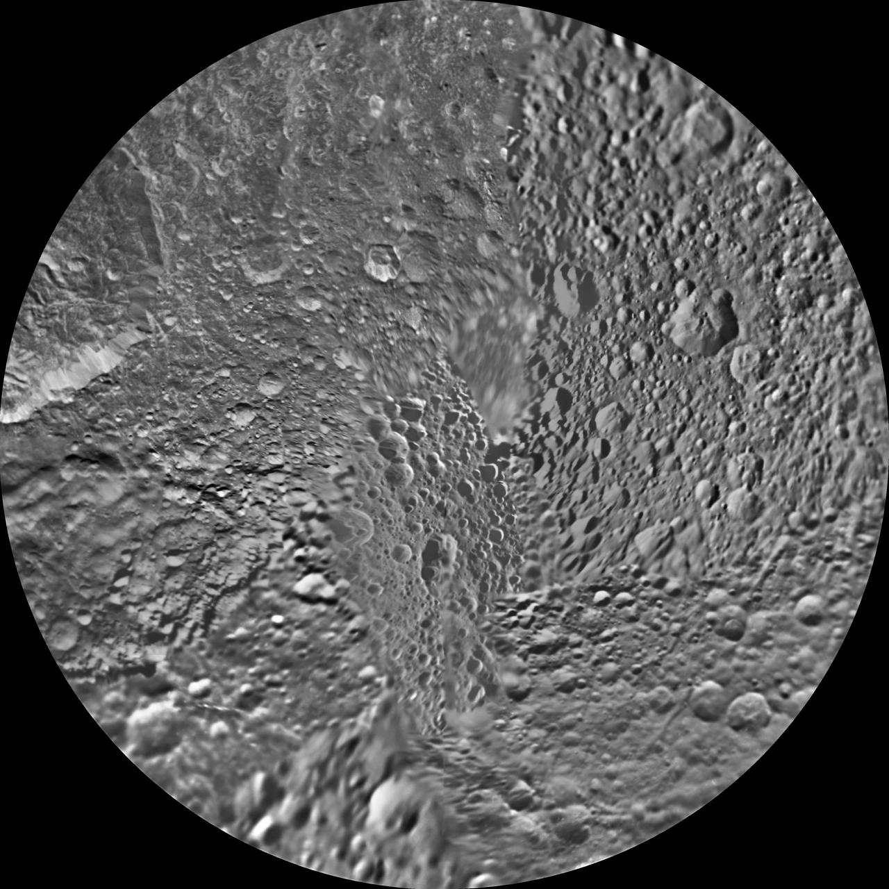 The northern and southern hemispheres of Saturn moon Mimas are seen in these polar stereographic maps, mosaicked from the best-available NASA Cassini and Voyager images.