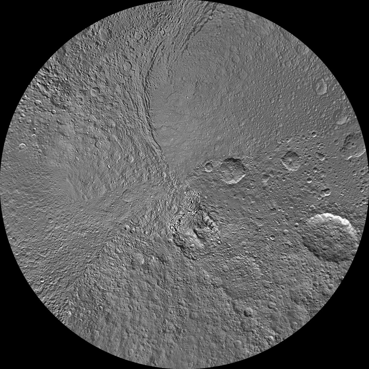 The southern hemisphere of Tethys is seen in this polar stereographic map, mosaicked from the best-available images from NASA Cassini spacecraft.