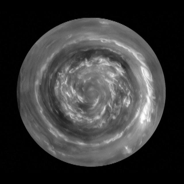 This image obtained by NASA Cassini spacecraft, shows the clouds of a hurricane-like storm, which circulate around the north pole of Saturn out to 88.5 degrees north latitude. The clouds at the very center are spinning rapidly.