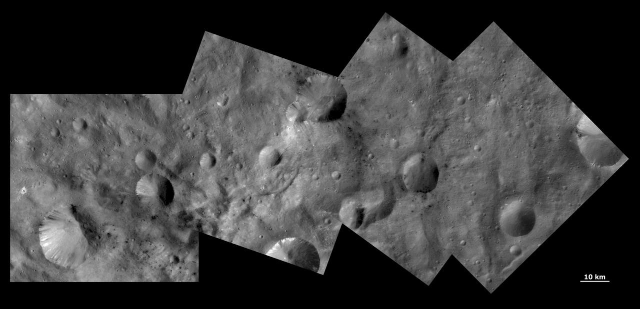 This image from NASA Dawn spacecraft shows craters with both sharp and smooth rims, a ghost crater and dark and bright material in asteroid Vesta southern hemisphere.