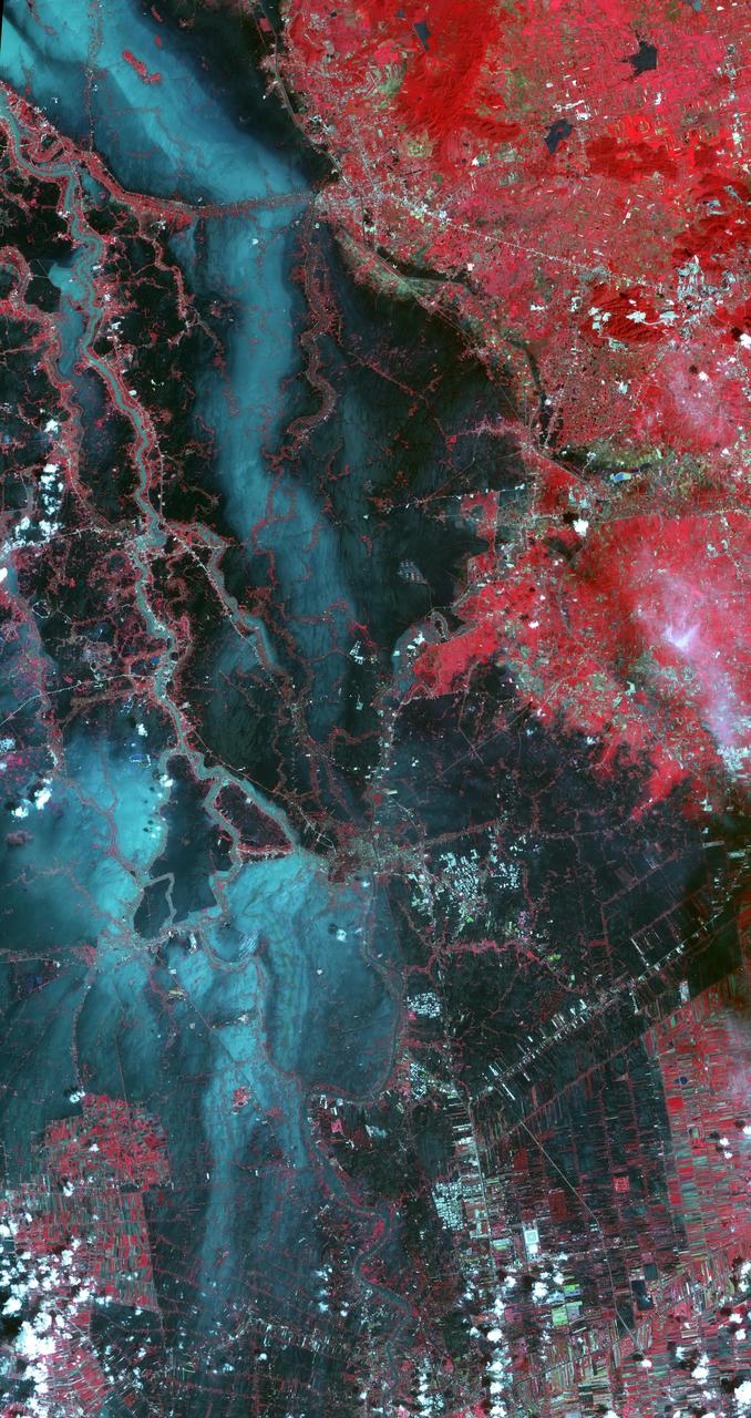 On Oct. 23, 2011, when this image from NASA Terra spacecraft was acquired, flood waters were approaching the capital city of Bangkok as the Ayutthaya River overflowed its banks.