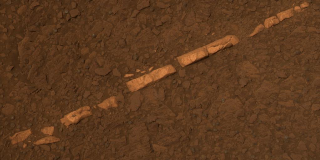 This color view from NASA Mars Exploration Rover Opportunity of a mineral vein called Homestake and is found to be rich in calcium and sulfur. Homestake is near the edge of the Cape York segment of the western rim of Endeavour Crater.