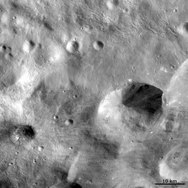 This image from NASA Dawn spacecraft is dominated by bright rayed craters of different sizes. The most prominent bright rayed crater is name Tuccia.