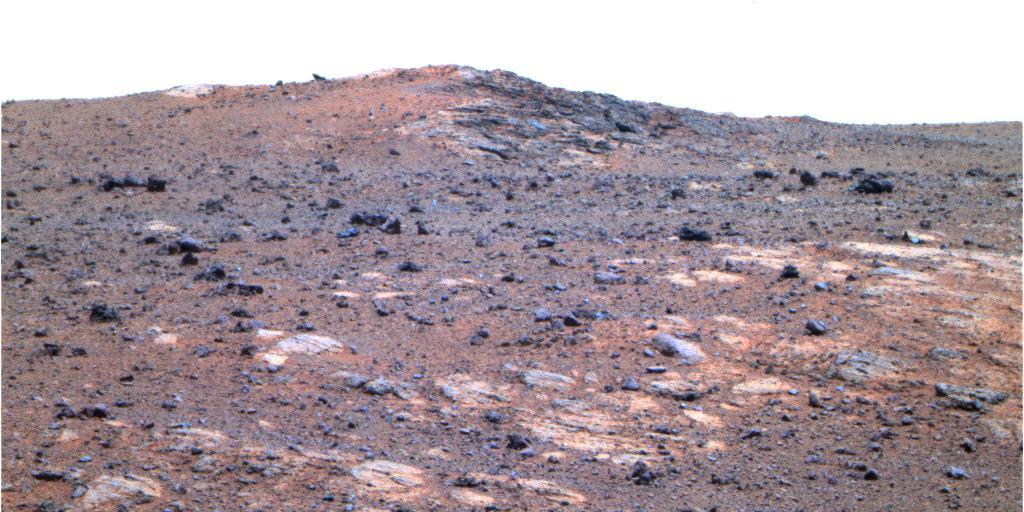 The feature informally named Shoemaker Ridge in the Cape York segment of the western rim of Endeavour Crater includes outcrops that are likely impact breccias as seen by NASA rover Opportunity.