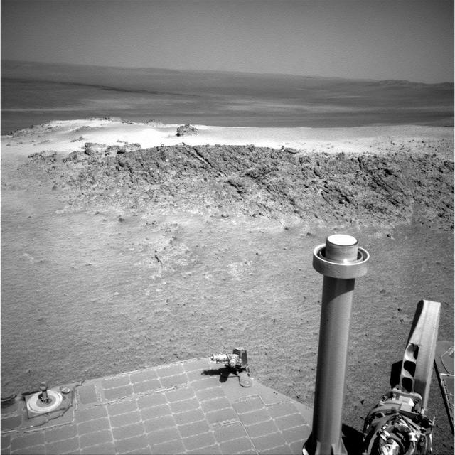 NASA Mars Exploration Rover Opportunity used its navigation camera to capture this view of a northward-facing outcrop, Greeley Haven, where the rover will work during its fifth Martian winter.
