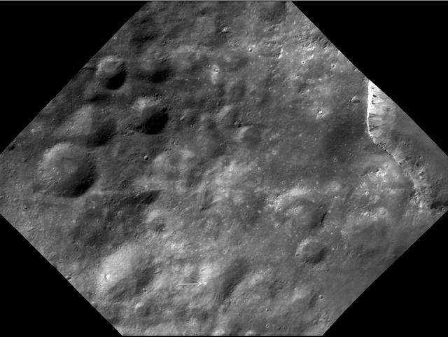 Numerous small, bright spots appear on asteroid Vesta, as seen in this image from NASA Dawn spacecraft. This region is just north of the equator, to the west of Marcia crater.