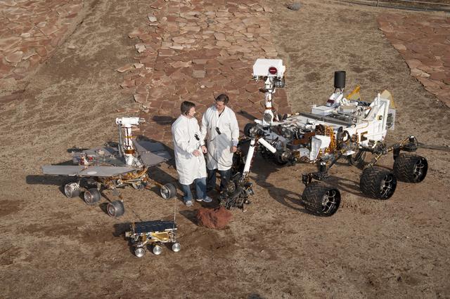 NASA image: Three Generations of Rovers with Standing Engineers