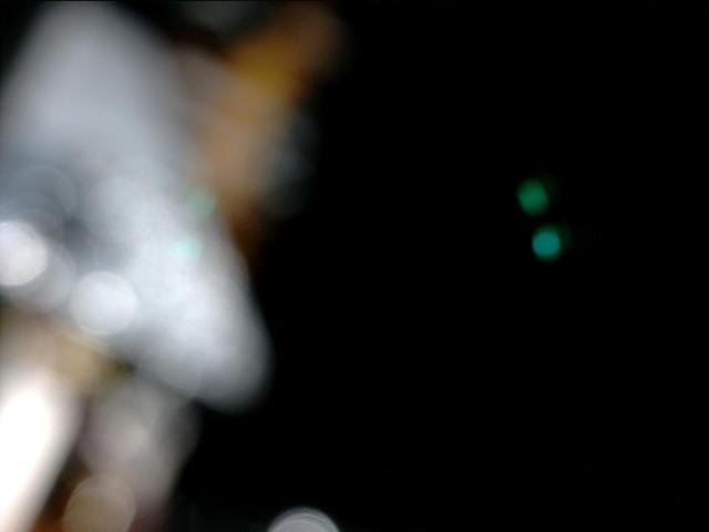 An in-flight camera check produced this out-of-focus image when NASA Mars Science Laboratory spacecraft turned on illumination sources that are part of the Curiosity rover Mars Hand Lens Imager MAHLI instrument.