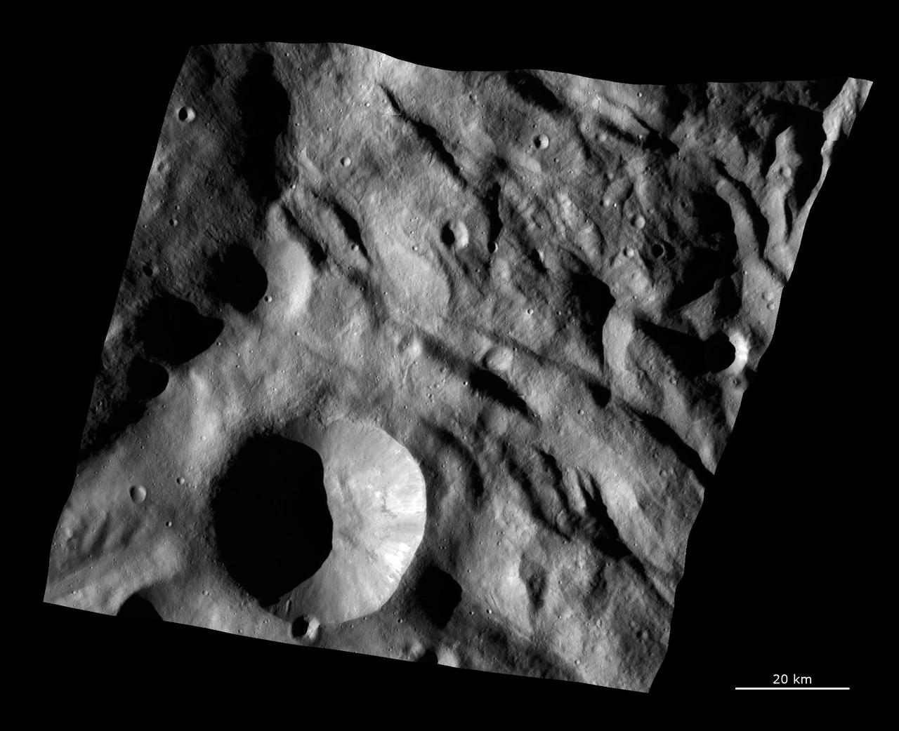 This image from NASA Dawn spacecraft shows the texture of the surface in a part of asteroid Vesta southern hemisphere. This region is just north of the main Rheasilvia structure.