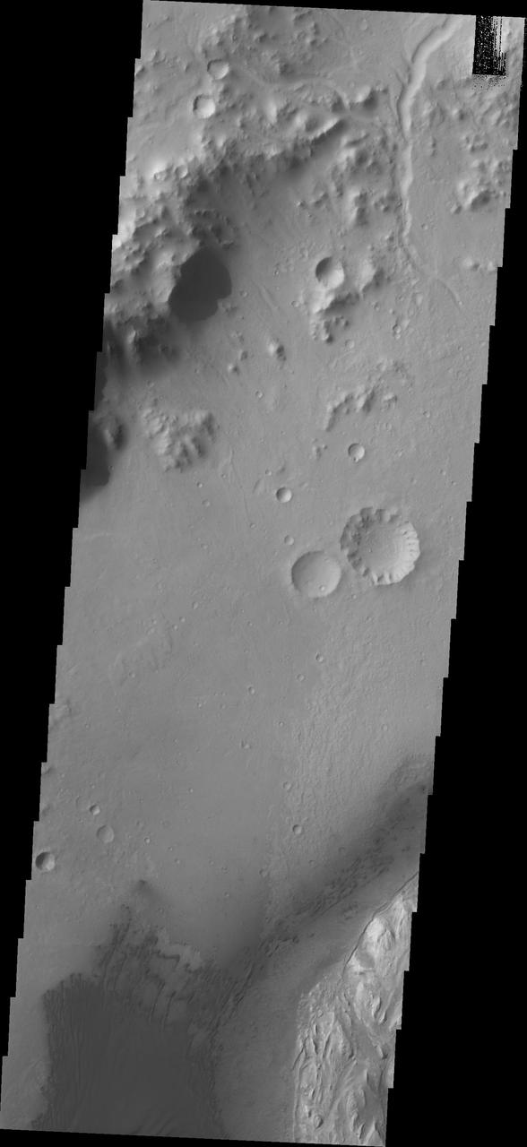 This image from NASA 2001 Mars Odyssey spacecraft shows the dunes located on the floor of Gale Crater.