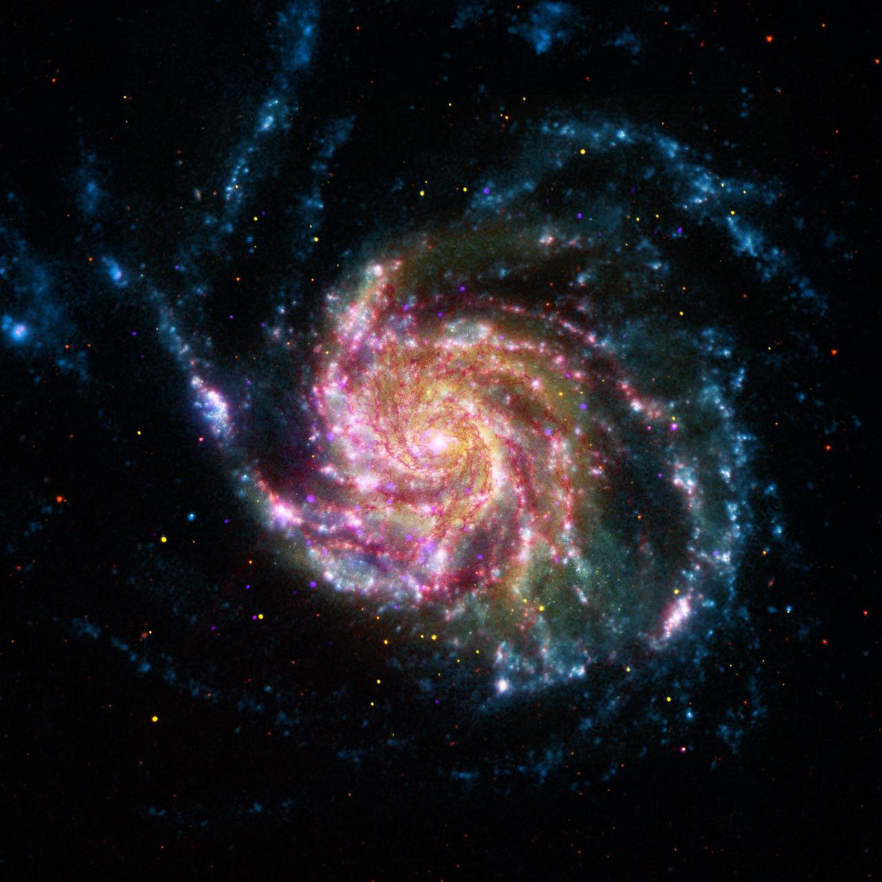 This image of the Pinwheel Galaxy, or M101, in the constellation of Ursa Major, combines data from four of NASA space telescopes. The view shows that both young and old stars are evenly distributed along M101 tightly wound spiral arms.