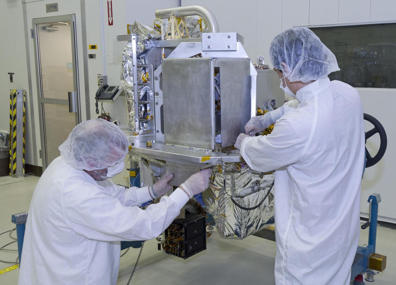 Technicians prep NASA OCO-2 instrument for shipping at Jet Propulsion Lab in Pasadena, Ca.