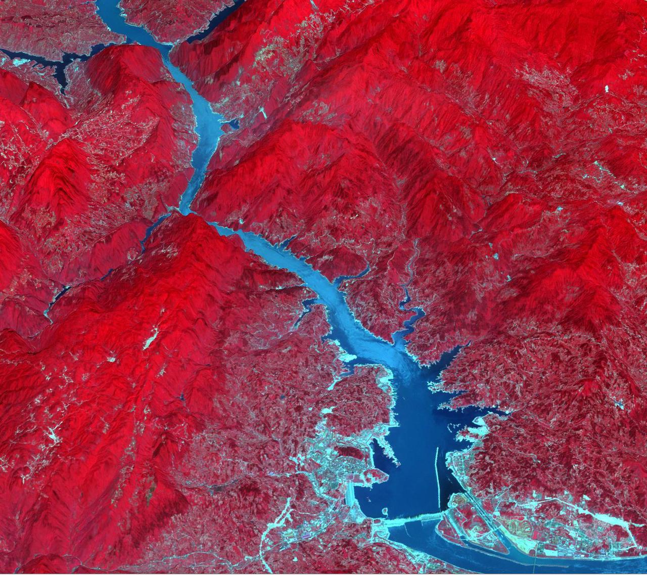 Acquired by NASA Terra spacecraft, this image shows the Three Gorges Dam which spans the Yangtze River in east-central China, and is the world largest power station in terms of installed capacity.