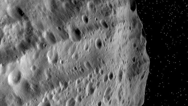 NASA image: Huge Troughs on Vesta