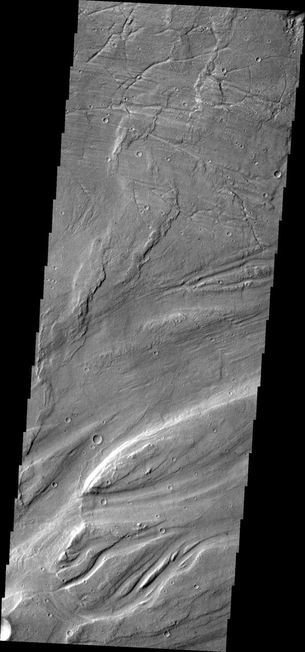 The complex channel and streamlined islands are part of Maja Valles as seen by NASA 2001 Mars Odyssey spacecraft.