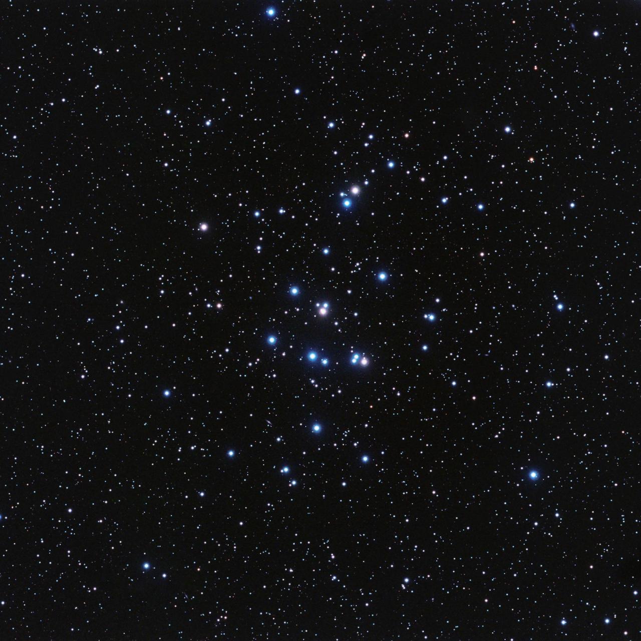 This image of the Beehive star cluster points out the location of its first known planets, Pr0201b and Pr0211b, or, as astronomers call them, the first b in the Beehive.