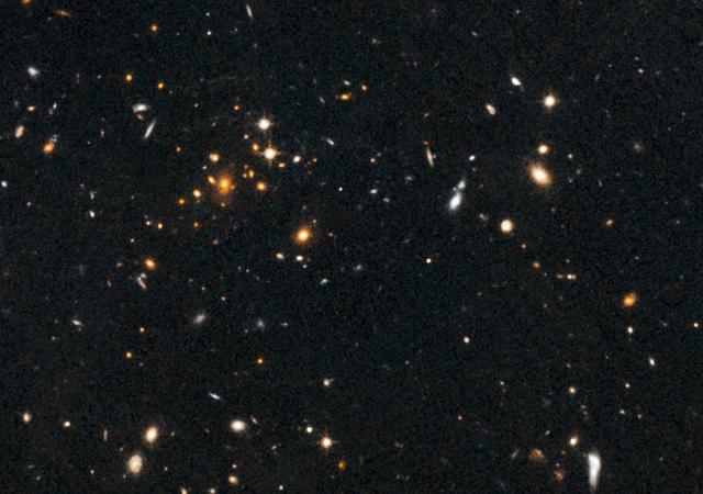 Astronomers using NASA Hubble Space Telescope have found a puzzling arc of light behind an extremely massive cluster of galaxies residing 10 billion light-years away.