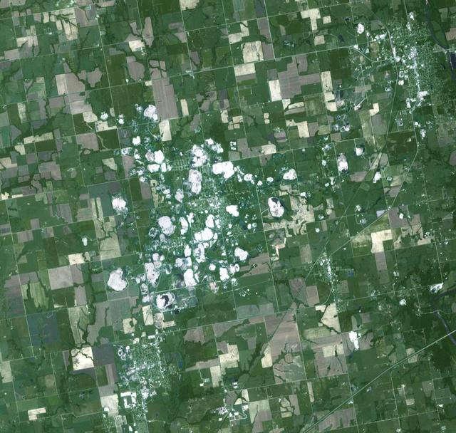 NASA Terra spacecraft acquired this image of Picher, Oklahoma which once boasted 20,000 people in this mining town in northeast Oklahoma. Now, after a 2009 tornado, and a federal cleanup program, the town is a modern-day ghost town.