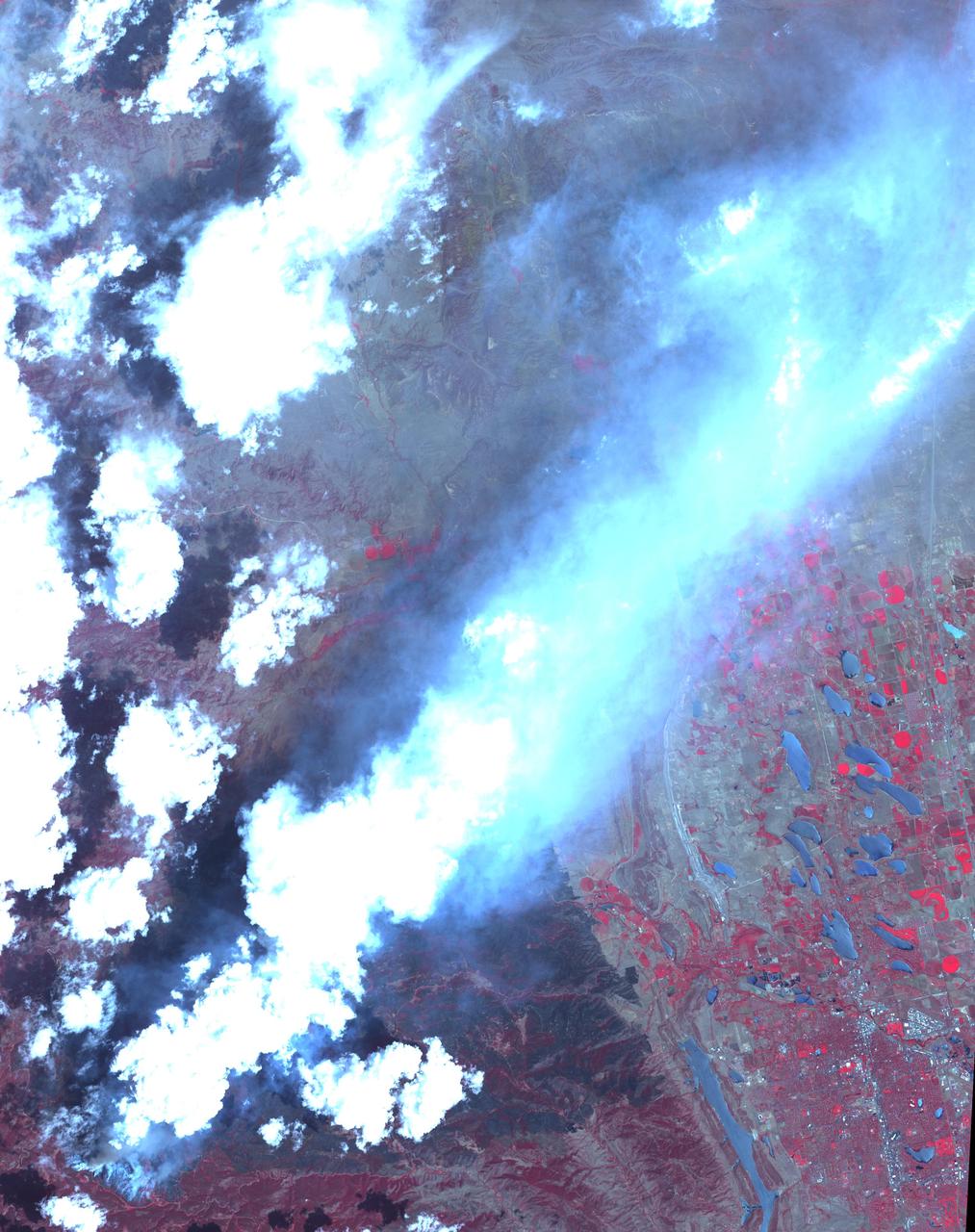 Acquired by NASA Terra spacecraft on June 25, 2012, this image shows the High Park fire west of Fort Collins, Colo. More than 83,000 acres have been burned and approximately 250 homes, the most in Colorado history.