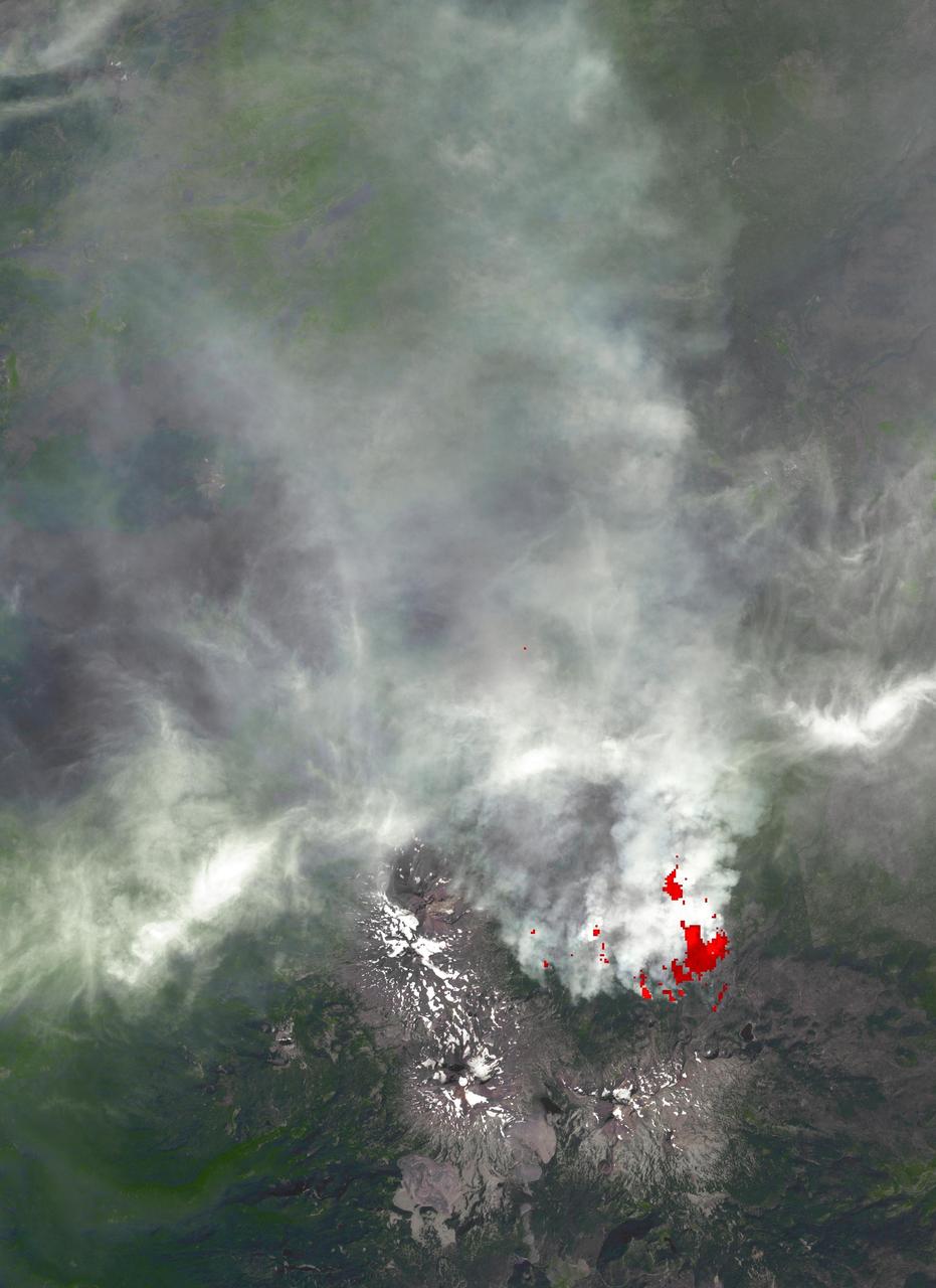 This image, acquired by NASA Terra spacecraft, is of the Pole Creek fire southwest of Sisters, Ore., which had grown to 24,000 acres as of Sept. 20, 2012. No structures have been destroyed, and the fire is mostly confined to the national forest.