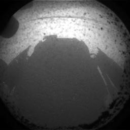 This is the first image taken by NASA Curiosity rover, which landed on Mars the evening of Aug. 5 PDT morning of Aug. 6 EDT. It was taken through a fisheye wide-angle lens on one of the rover front left Hazard-Avoidance cameras.