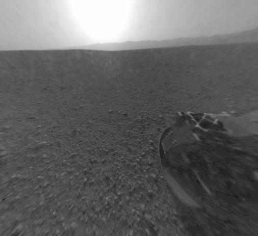 This is a version of one of the first images taken by a rear Hazard-Avoidance camera on NASA Curiosity rover and shows part of the rim of Gale Crater, which is a feature the size of Connecticut and Rhode Island combined.