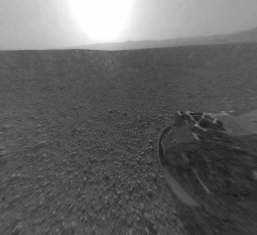 This is a version of one of the first images taken by a rear Hazard-Avoidance camera on NASA Curiosity rover and shows part of the rim of Gale Crater, which is a feature the size of Connecticut and Rhode Island combined.