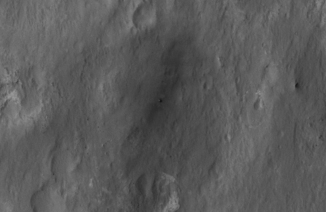 This close-up view shows NASA Curiosity rover on the surface of Mars. The image was captured by the NASA Mars Reconnaissance Orbiter about 24 hours after the rover made its grand appearance on Mars.
