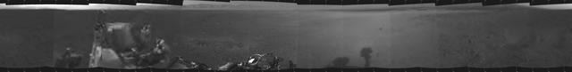 This is the first 360-degree panoramic view from NASA Curiosity rover, taken with the Navigation cameras. Mount Sharp is to the right, and the north Gale Crater rim can be seen at center. The rover body is in the foreground.