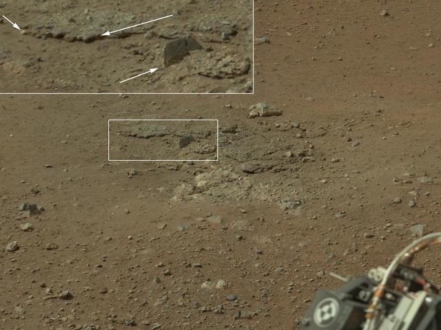 This color image from NASA Curiosity rover shows an area excavated by the blast of the Mars Science Laboratory descent stage rocket engines. This is part of a larger, high-resolution color mosaic made from images obtained by Curiosity Mast Camera.