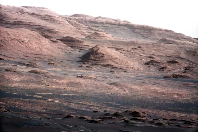 A chapter of the layered geological history of Mars is laid bare in this postcard from NASA Curiosity rover. The image shows the base of Mount Sharp, the rover eventual science destination.