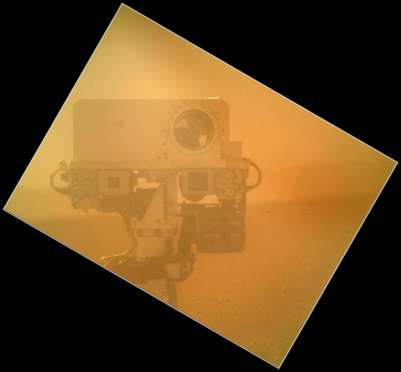 On Sol 32 Sept. 7, 2012 the Curiosity rover used a camera located on its arm to obtain this self portrait. The MAHLI cover was in the closed position in order to inspect the the dust cover.