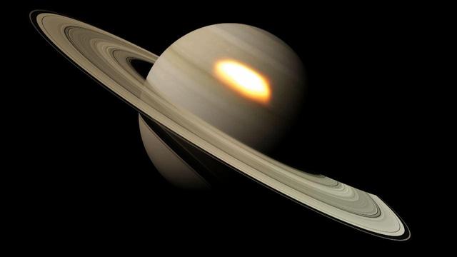 This image from an animation shows beacons of hot air seen in the infrared that appeared during a great springtime storm on Saturn from January 2011 to March 2012.