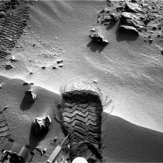 NASA Mars rover Curiosity cut a wheel scuff mark into a wind-formed ripple at the Rocknest site to give researchers a better opportunity to examine the particle-size distribution of the material forming the ripple.